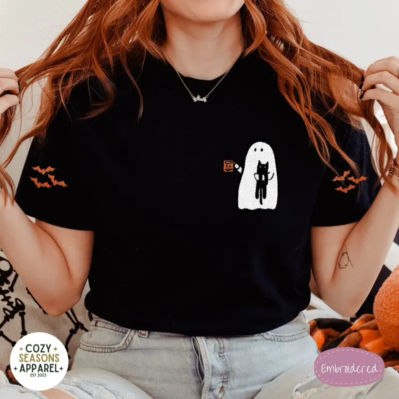 Women's Embroidered Halloween T-Shirt - Comfort Colors® Womenswear Top, Bat Sleeves, Round Neck, Short Sleeve, Cat & Ghost Design, Casual Loose-Fitting Tee for Cat Lovers Everyday Aesthetic Outfits Unisex Tshirt Style Dream Fabric