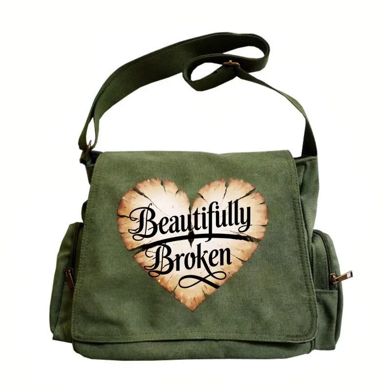 Women’s vintage large-capacity casual shoulder bag — a fashionable crossbody bag with a flap closure design, heart-shaped crack pattern, “Beautifully Broken” print, and an internal zippered pocket; perfect for everyday outings and travel, and an excellent