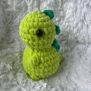 Handmade crochet dinosaur plush