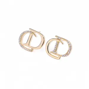 Sparkling Double D Earrings: Copper-plated gold/silver with dazzling micro-paved zircon. Sleek luxury minimalist women’s jewelry. Each pair is packed in an exquisite gift box, perfect as a thoughtful present.