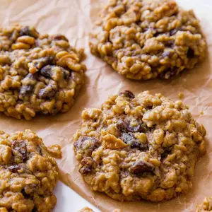 Oatmeal Raisin Cookies - Bite-Sized Decadent Chewy Texture Perfectly Baked Golden Brown Oatmeal & Raisin Snack Treat