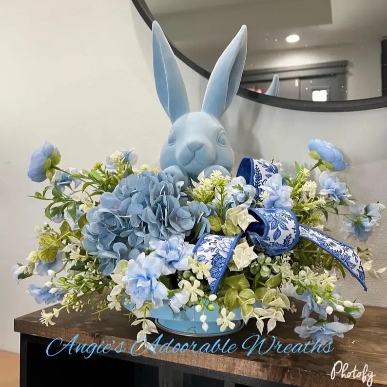 Beautiful Blue Bunny Easter Arrangement with Delicate Blue Hydrangeas and Greenery for Festive Decor