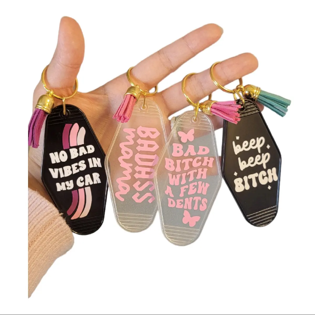 Cute & Funny Motel Keychains. Bada*s Mama( Glow in Dark), No Bad Vibes In My Car, Bad B*tch With a Few Dents (Glow in Dark), Beep Beep B*tch, Motherhood Messy Car Club, My Errands are Home Goods. Gift for Her, Gift for Mom pink keychain