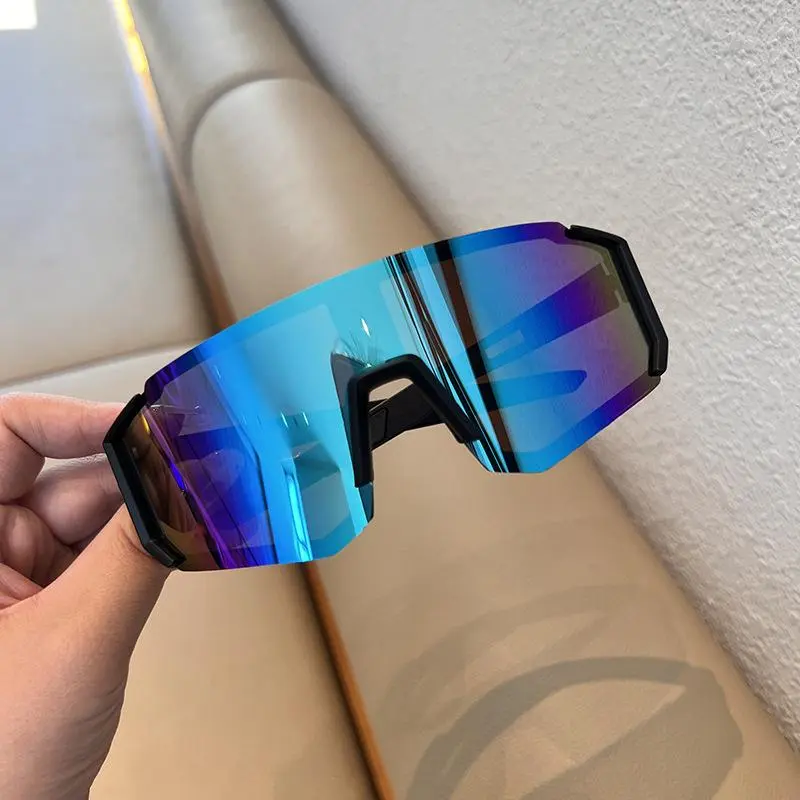 Black frame with green lenses