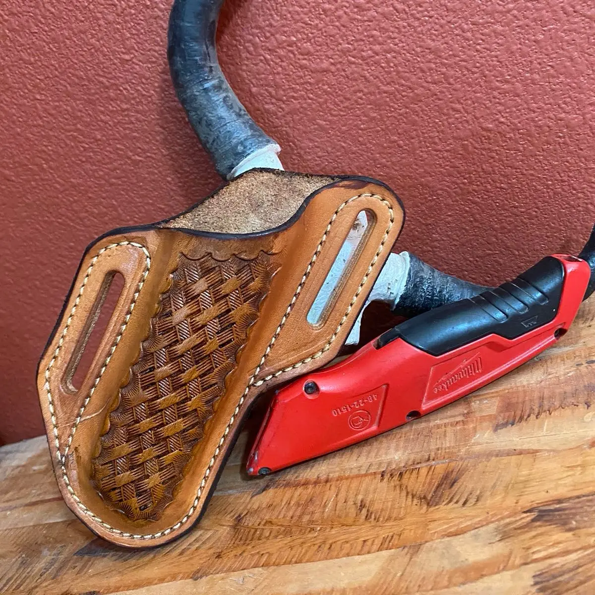 Tooled leather utility knife pouch sheath Tooled leather utility knife pouch sheath