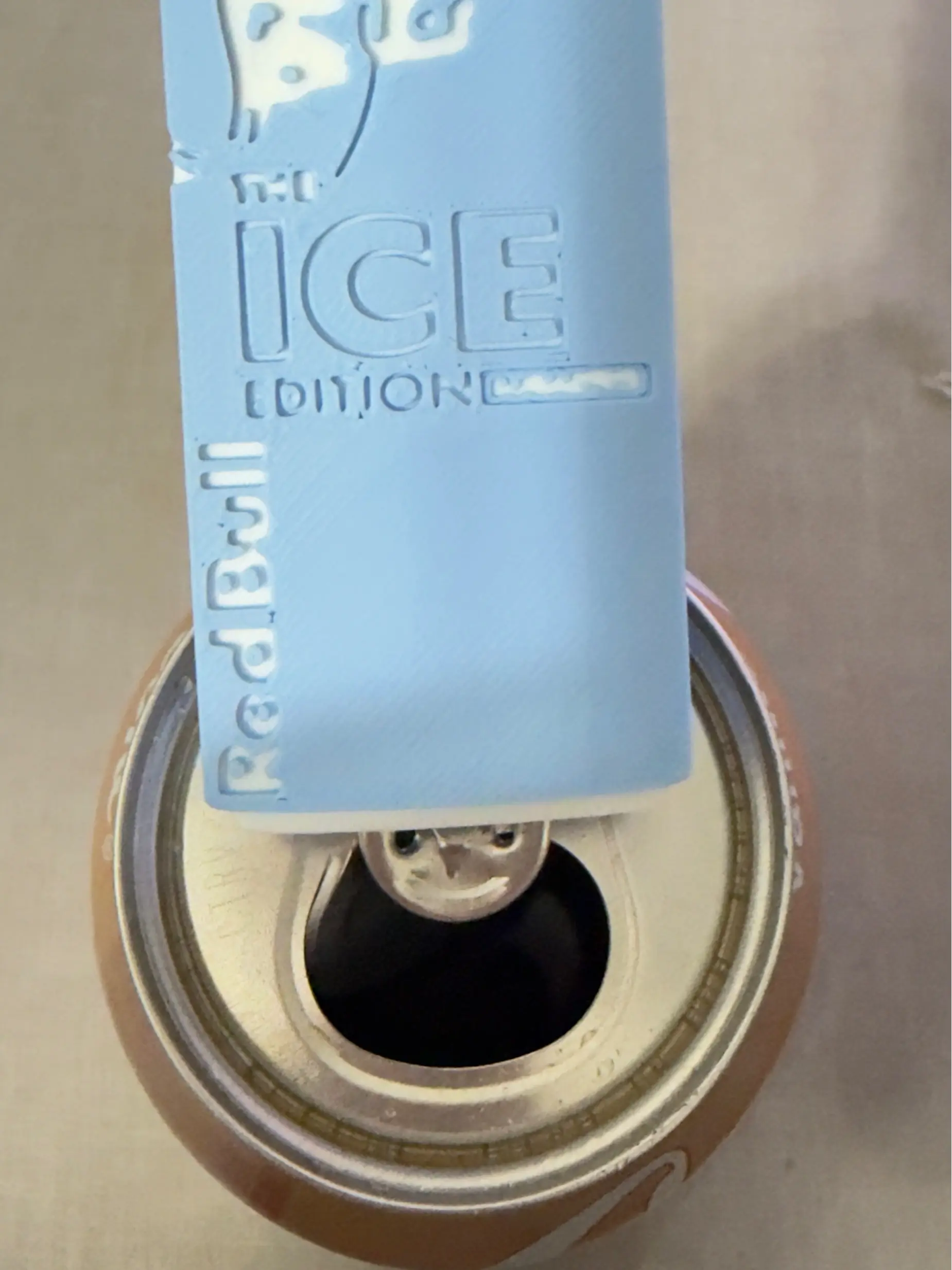 BABY BLUE REDBULL CAN OPENER