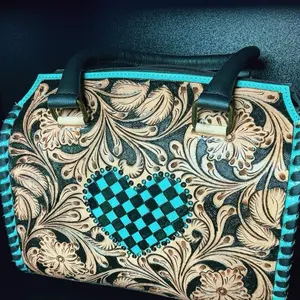 medium tooled leather speedy with teal and black checkered heart