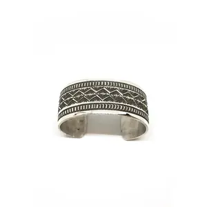 Wide Navajo Stamped Sterling Silver Cuff by Leonard Maloney