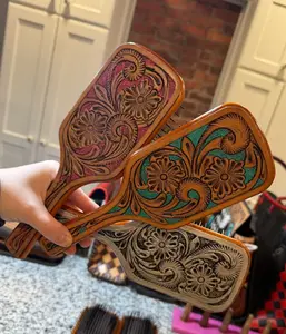 Genuine hand tooled leather hair brush