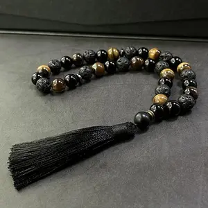 Handcrafted Bracelet Featuring 33 Beads Made of 10Mm Black Agate And Tiger'S Eye, Designed for Islamic Prayer And Pilgrimage. This Natural Stone Misbahah Serves As a Beautiful Accessory for Both Men And Women