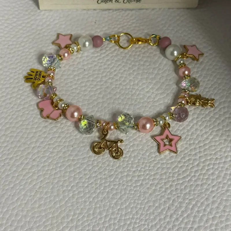 Eden and  Eloise Pink Star & Pearl Charm Bracelet with Gold Bike & Star Charms for Women