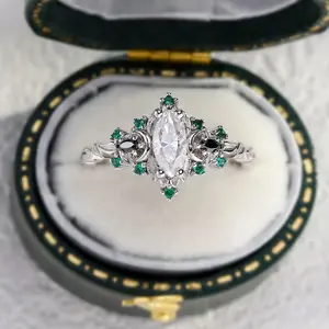 Unique Briar Moon Three Stone Marquise Moissanite and Lab Emerald Ring
