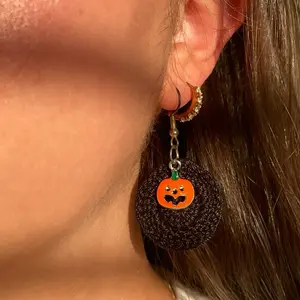 Crochet Earring with Pumpkin Charm Simple Design Earrings Featuring a Pumpkin Charm on a Crochet Background Unisex Jewelry 2 Inches Around Perfect for Any Occasion