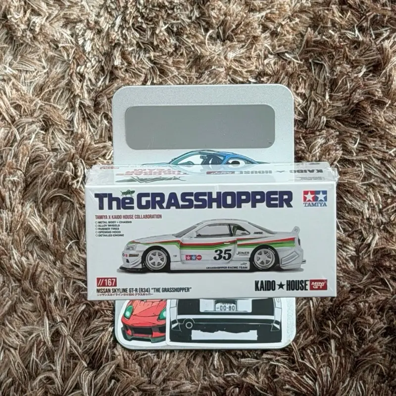 Tamiya Kaido House x Mini GT Nissan GT-R R34 The Grasshopper V1 1/64 Scale Collectible Diecast Model Car #167, New