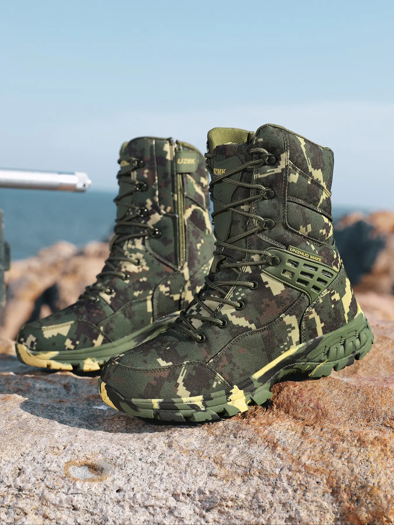 One pair of men's outdoor sports shoes. These high - top boots can serve as Durable Outdoor Hiking Tactical Boot. They have a camouflage pattern, a breathable fabric lining, and anti - slip soles, making them suitable as military boots.