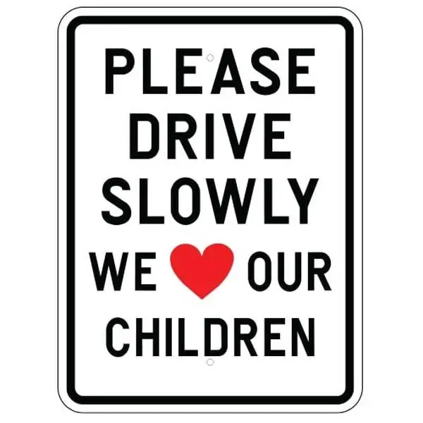 Please Drive Slowly We Love Our Children Sign