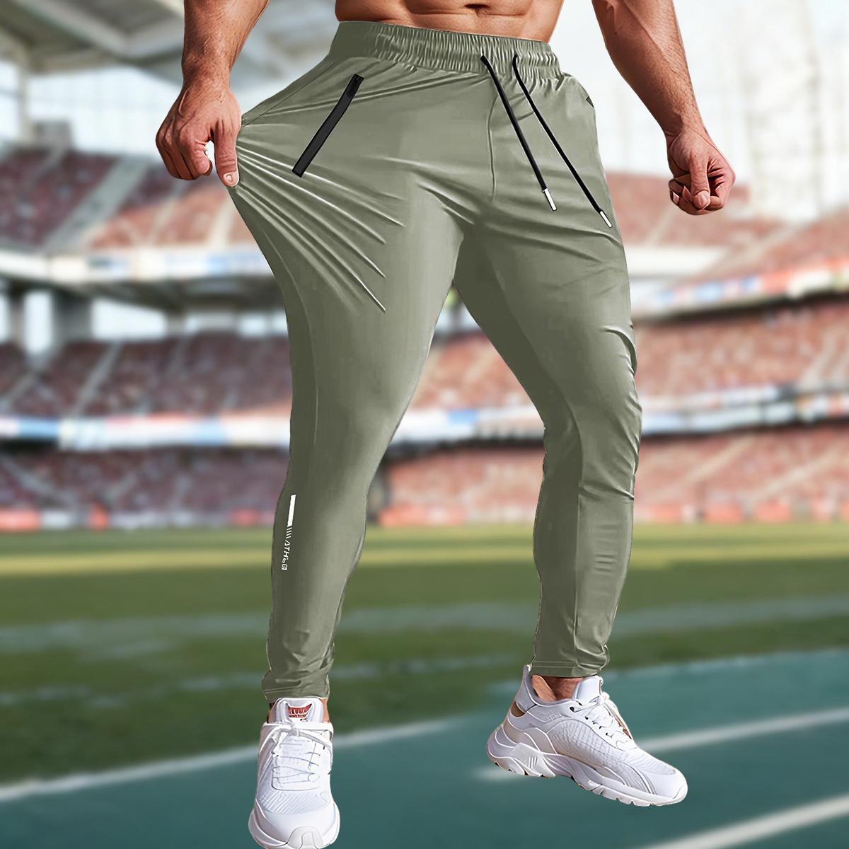 Men's lightweight ice silk fiber fabric joggers with quick-dry elastic waistband and hidden zipper design, breathable and comfortable straight-leg pants, suitable for casual wear, outdoor activities, and party style.