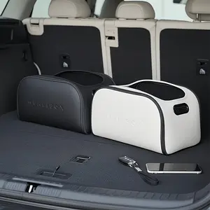 Car storage box made of leather offers ample space with a large opening on the passenger side and a large capacity trunk organizer