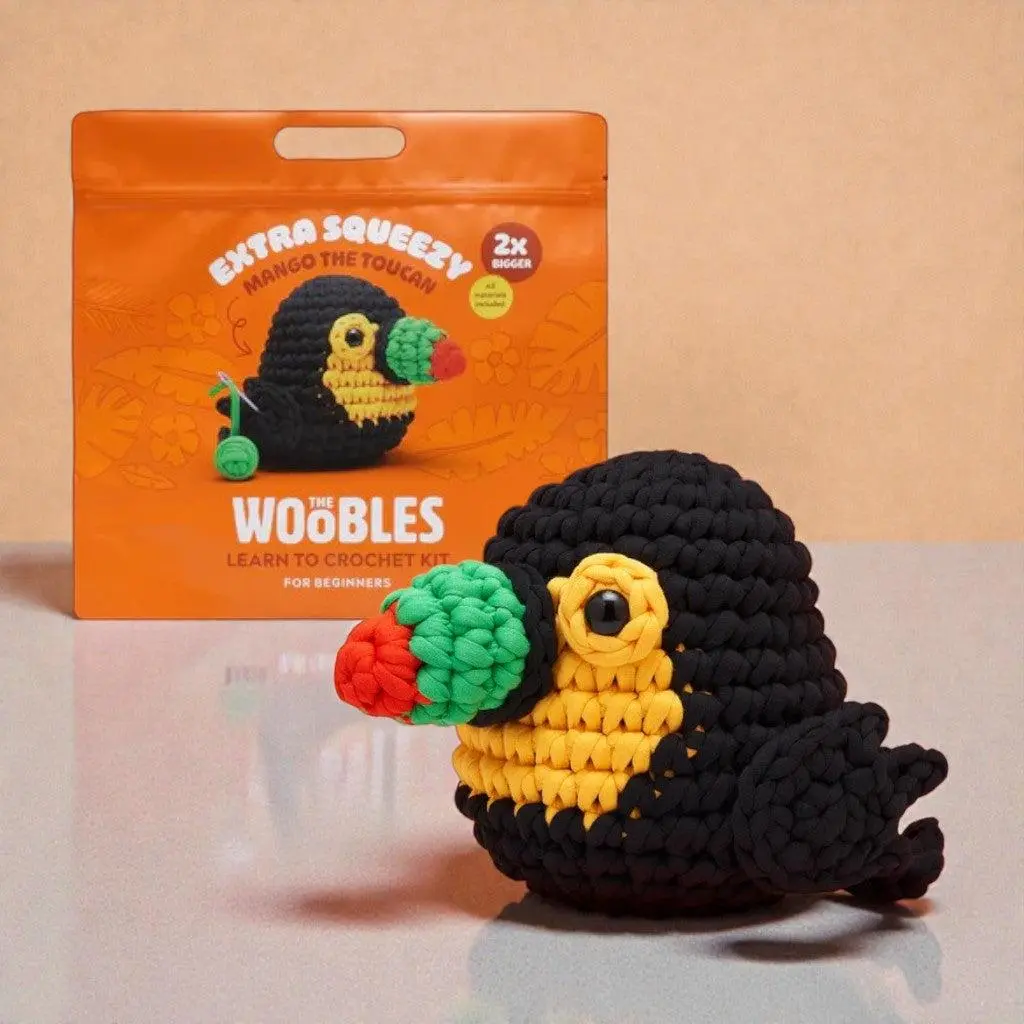 The Woobles Extra Squeezy Beginner Crochet Kit Mango the Toucan 7" Tall 6" Wide Easy Peasy Yarn Snag Free Success Magic Start Lefties Righties Rejoice Vibrant Colors Polyester Fiberfill Tools Hook Roadmap