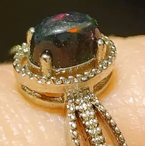 Black Opal Crystal Ring with Intricate Silver Filigree and Multi-Color Opal Stones