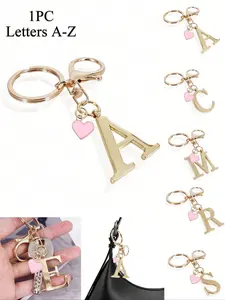 1pc Gold Letter Keychain, Keychain Kawaii, Letter A-Z Three-Dimensional Pendant, With Pink Heart Pendant, Alloy Keychain Ring, Backpack Charm Car Keychain, Women's Daily Use Accessory, Couple Gift, Classic And Simple Keychain