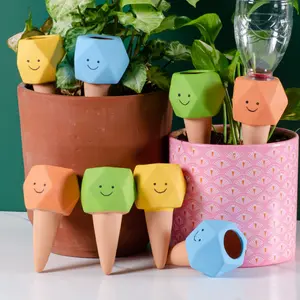 4 Pcs Terracotta Watering Stakes with Playful Faces, Automatic Plant Watering System for Indoor/Outdoor Potted Plants, Vacation Plant Care