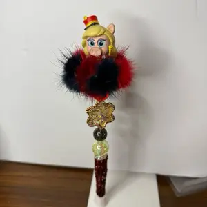 Missy Piggy pen with a Fidget Spinner Star