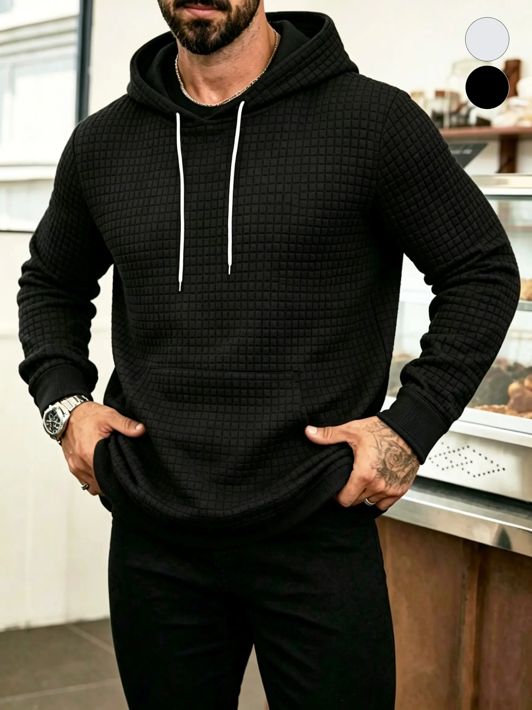 Men’s waffle-textured hooded sweatshirt with a slim fit, drawstring pullover design, ribbed cuffs at the sleeve ends, and a soft, breathable, lightweight fabric. A casual long-sleeve hoodie suitable for everyday wear, relaxing at home, street-style looks,