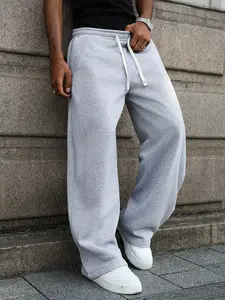 Men's loose casual sports pants, versatile street style athletic trousers suitable for streetwear, everyday loungewear, weekend outings, featuring a relaxed fit, designed specifically for men, gray loose sweatpants