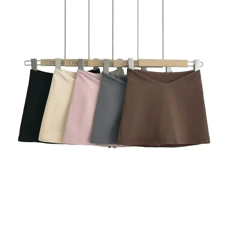 Junior Girl's Solid Color Low Waist Mini Skirt with Built-In Shorts Elegant Versatile Design for Casual & Evening Wear