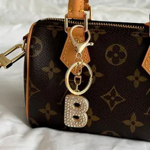 EVRY JEWELS Women's Adore Me Bag Charm