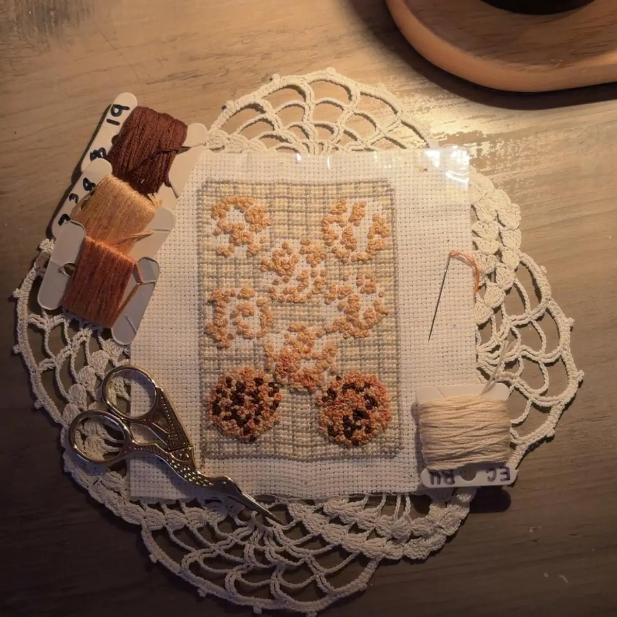 Cookie tray cross stitched design ~ Designed to be an ornament ~ cross stitched fabric