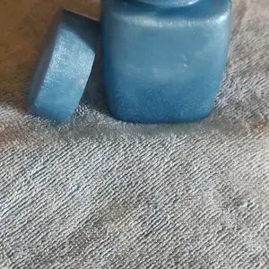 medium blue twist top jar made of resin with lid