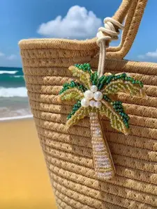 Beachside holiday wind beaded coconut tree pendants, hand-woven accessories, three-dimensional pearl coconut tree decorative pendants, small and exquisite versatile pendants, versatile personality suitable for daily travel.