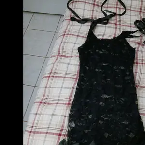 Becky Black See Through Fitted Mini Dress with Adjustable Straps and Elegant Design