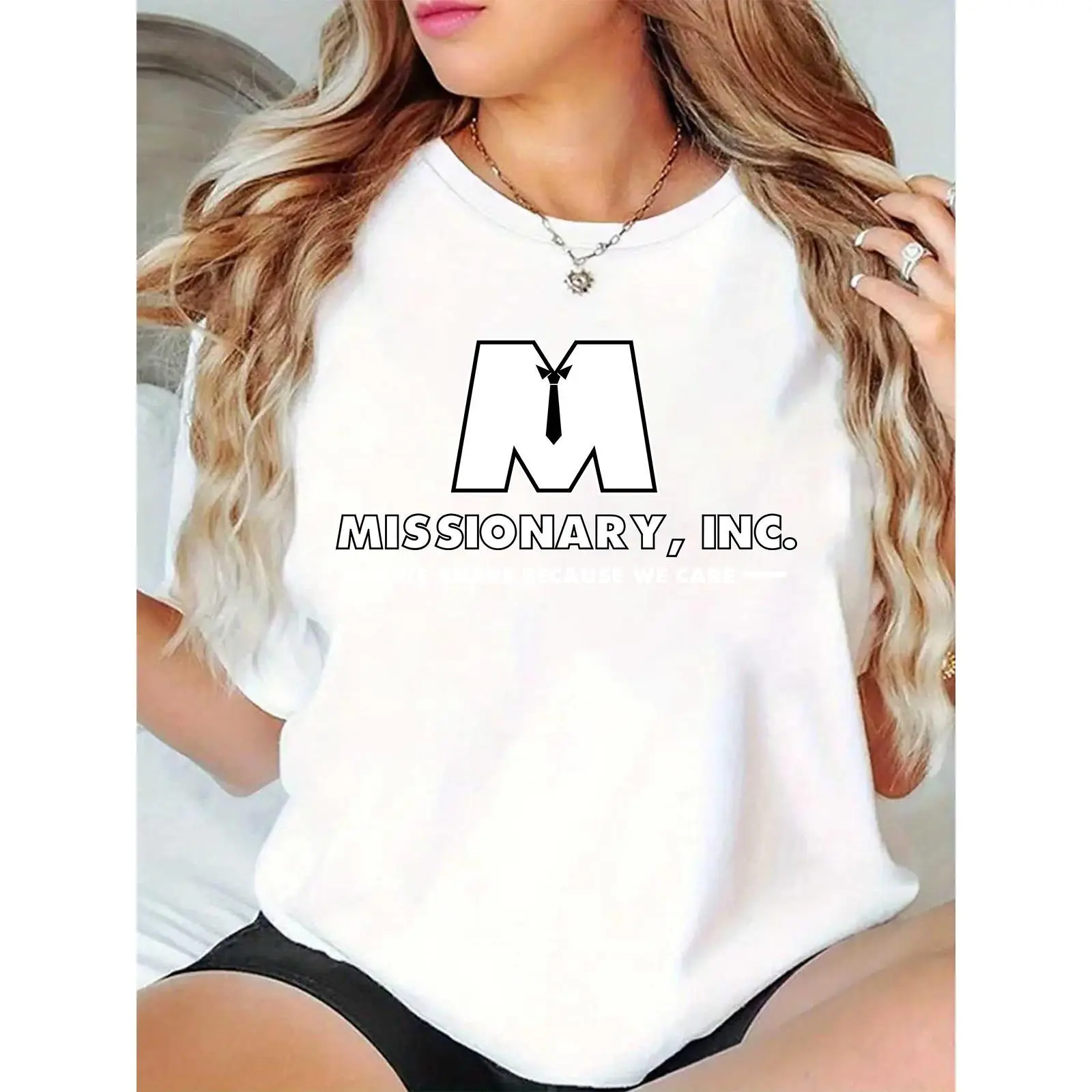 Women’s White T-Shirt with 'M' Tie Graphic & 'Missionary, Inc.' Slogan – Casual Daily/Community Wear for Missionary Enthusiasts 100% Cotton T-shirt