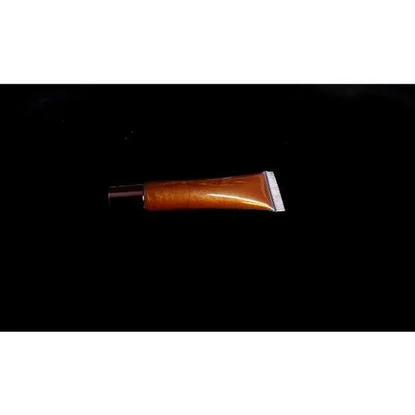 Athena  Mosturizing brown tinted Lipgloss with gold shimmer