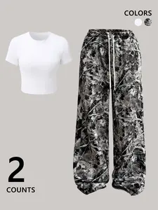 "2-Pack Black Crop Top + Monochrome Leaf Camo Pants Set | Slim-Fit Tee + Wide-Leg Bottoms – 2025 TikTok Viral Dark Coquette Aesthetic! Moody Nature Print, Comfy Relaxed Fit 🔥 Perfect for #OOTD, #StreetwearVibes, #Y2KRevival. Stylish for Brunch, Hangouts