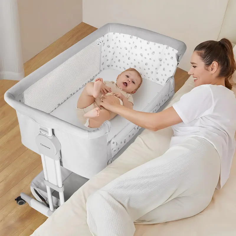 Cowiewie Bassinet Bedside Sleeper, Rocking Bassinet for Baby with 4 Wheels & 7 Adjustable Height, 360° All-Round Breathable Mesh Sides Bedside Crib, 2025 New