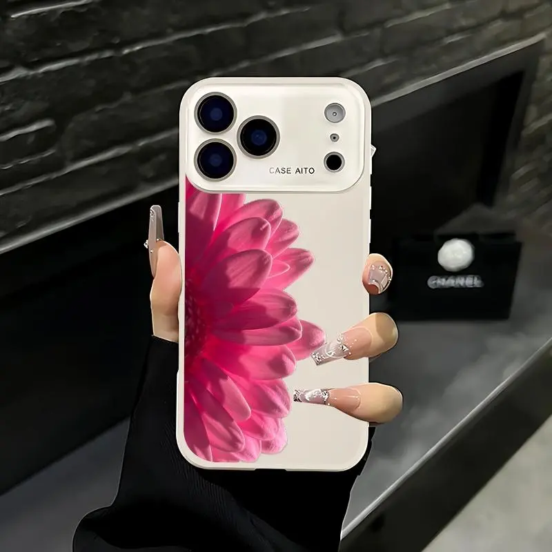 Rose pink gerbera daisy pattern phone case. Compatible with iPhone 17 Pro Max, 16 Pro Max, 15 Pro Max, and 14 Pro Max. Includes lens protection. Also compatible with iPhone 15, 14, 13, and 12. Made of skin-friendly TPU material.