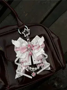 Y2K Anime Music Note Keychain Charms Lace spliced 3D wing design with star foil and bow details. Handmade Lolita bag charm and card accessory. Perfect gift for back to school, weddings, graduation, Mother’s Day, Teachers’ Day and Valentine’s Day.