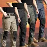 HOMUG 4pcs Men's Tactical Work Pants are equipped with a stretch waistband and pockets. Featuring a knee-pad design and crafted from a new 230g/㎡ fabric, they are ideal for spring and summer wear as well as outdoor activities.