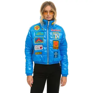 VINTAGE PATCH APRES PUFFER JACKET - BLUE CINA GLOSSY