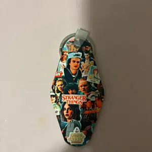 Stranger Things Keychain - Officially Licensed Collectible Accessory with Iconic Characters and Unique Design