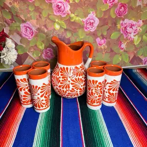 Jarra naranja con sus 6 vasos