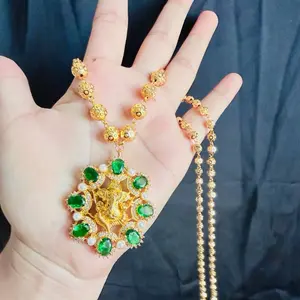 Ball Necklace with Ganesh Pendant Elegant Stone Work for Women Green Gemstone Accents