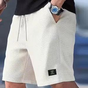 Men’s summer casual shorts—soft and comfortable, with side pockets and a drawstring elastic waistband. Suitable for outdoor sports, everyday wear, travel, and vacations. Beige men’s shorts; men’s summer apparel.