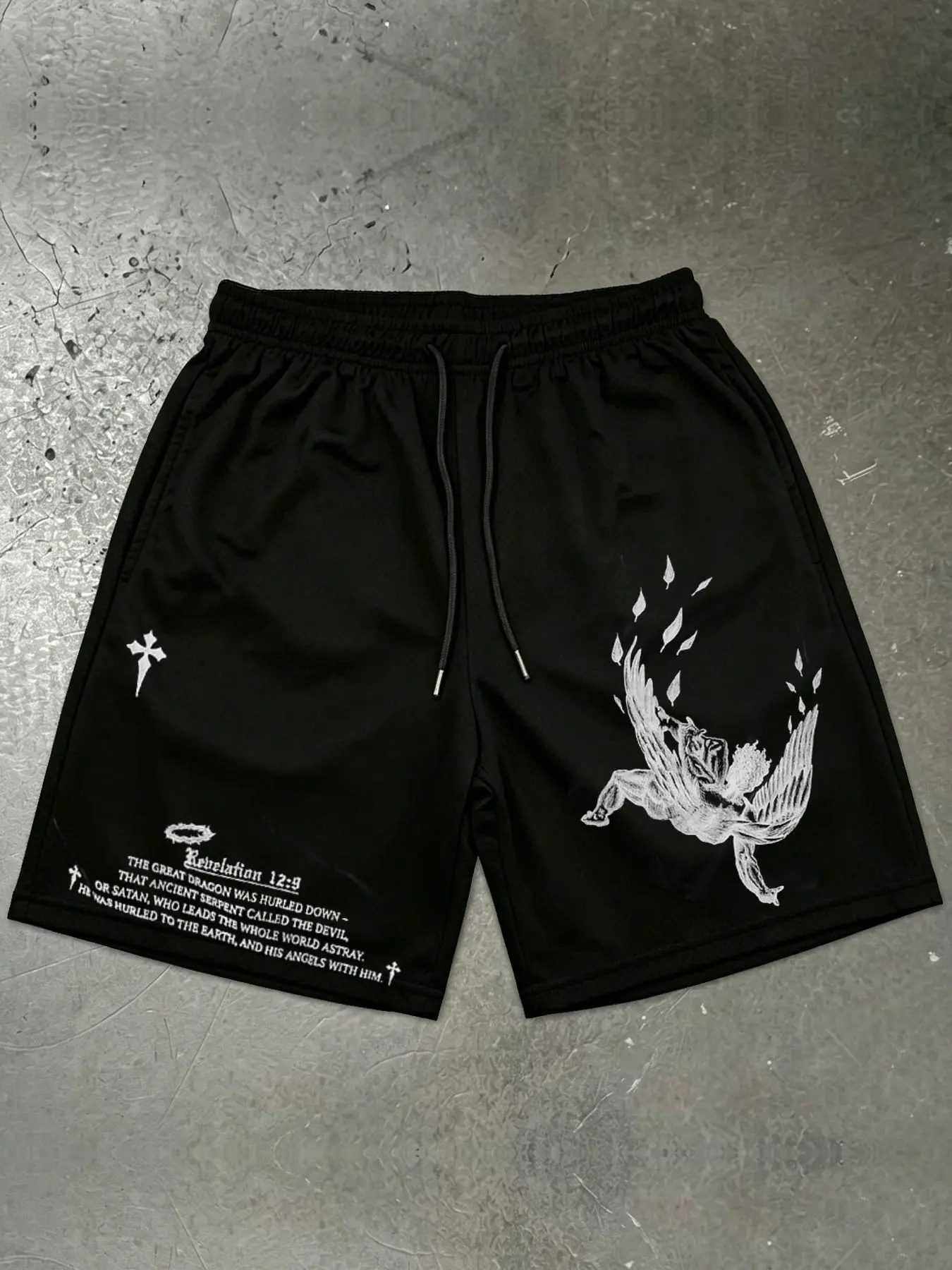 1 PCS Black Mesh Shorts, "Revelation 12:9" Fallen Angel Cross Graphic Print, Gothic Faith-Inspired Streetwear, Breathable Drawstring Athletic Shorts, Ideal for Gym, Casual Wear & Urban Fans