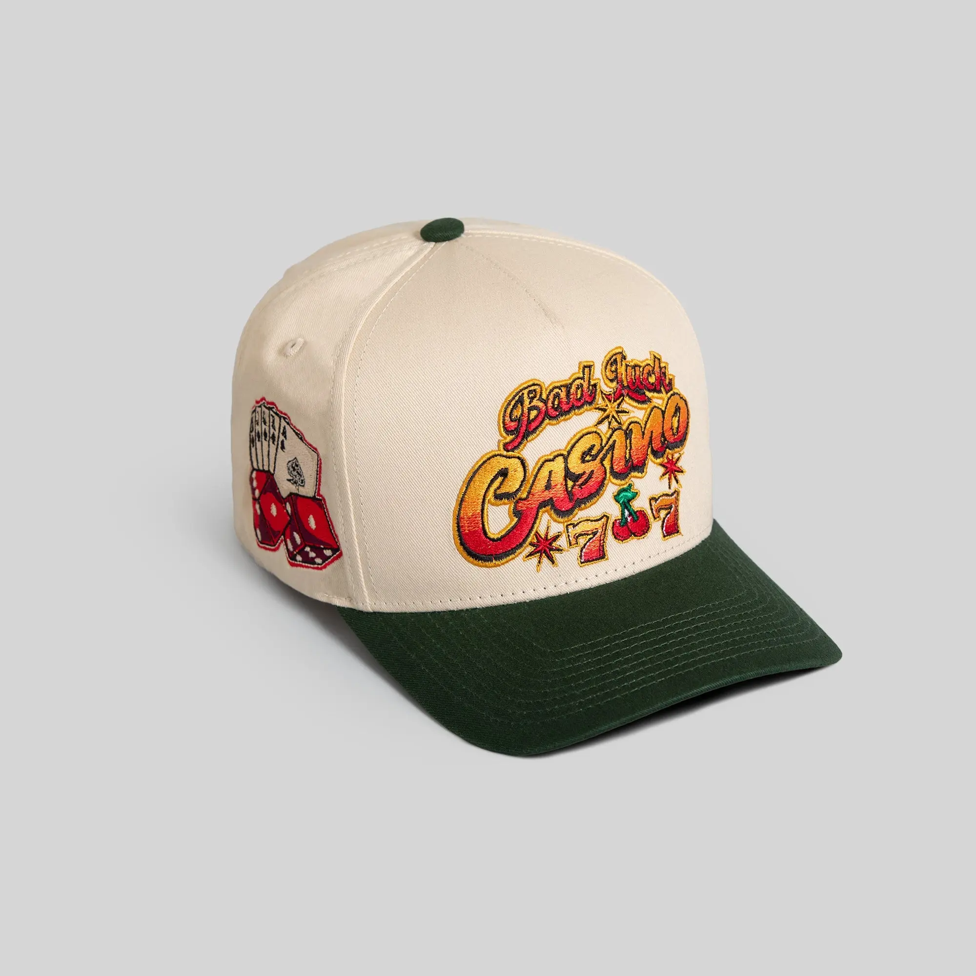 Field Grade Bad Luck Casino Sand Green Twill | trucker hat | twill material | mesh back | embroidered | beige hat | adjustable | streetwear | unisex | dad hat | outdoor | casual | Trendy Hat 2026 | Streetwear Headwear | Fashion Cap | Summer Hat | Sun Hat