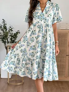 A women's V-neck short-sleeve midi dress with a layered skirt, featuring white fabric with blue hydrangea prints, Womenswear, exuding an everyday style, suitable for city shopping, afternoon tea with friends, or light commuting occasions